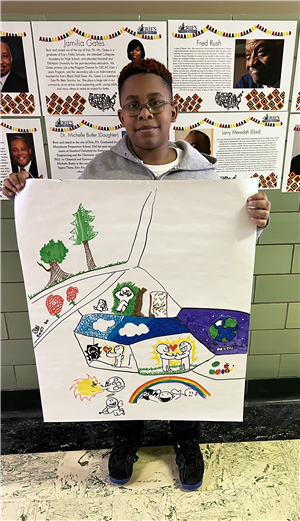 Edison student Jimeek shows a picture with his vision of a wonderful world. includes trees, rainbows, Earth, and people.